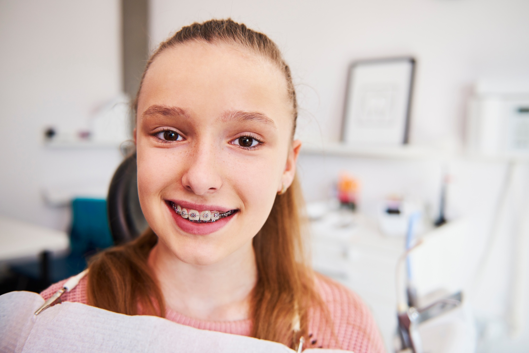 Portrait of smiling teenage girl with braces